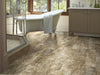 By The Grove Sd Vinyl Commercial by Shaw Floors in the color Lucca flooring in a home, showing the finished look.