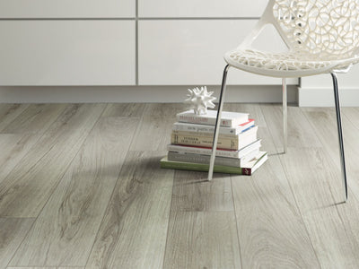 Tivoli Plus Vinyl Residential by Shaw Floors in the color Pecorino flooring in a home, showing the finished look.