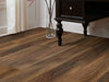 Tivoli Plus Vinyl Residential by Shaw Floors in the color Arancia flooring in a home, showing the finished look.