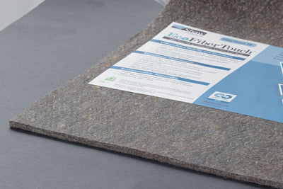 Fibertouch 28-6 Indoor/Outdoor Carpet by Shaw Floors in the color Grey. Image of  carpet in a room.