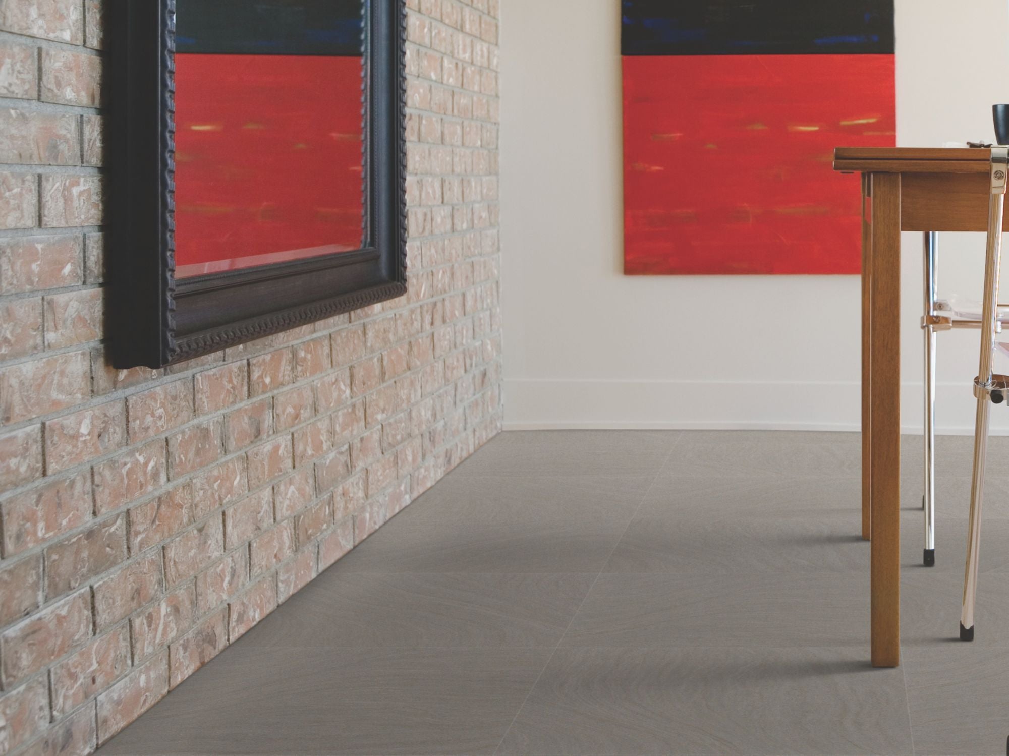 Fresco Vinyl Commercial by Shaw Floors in the color Graphite flooring in a home, showing the finished look.