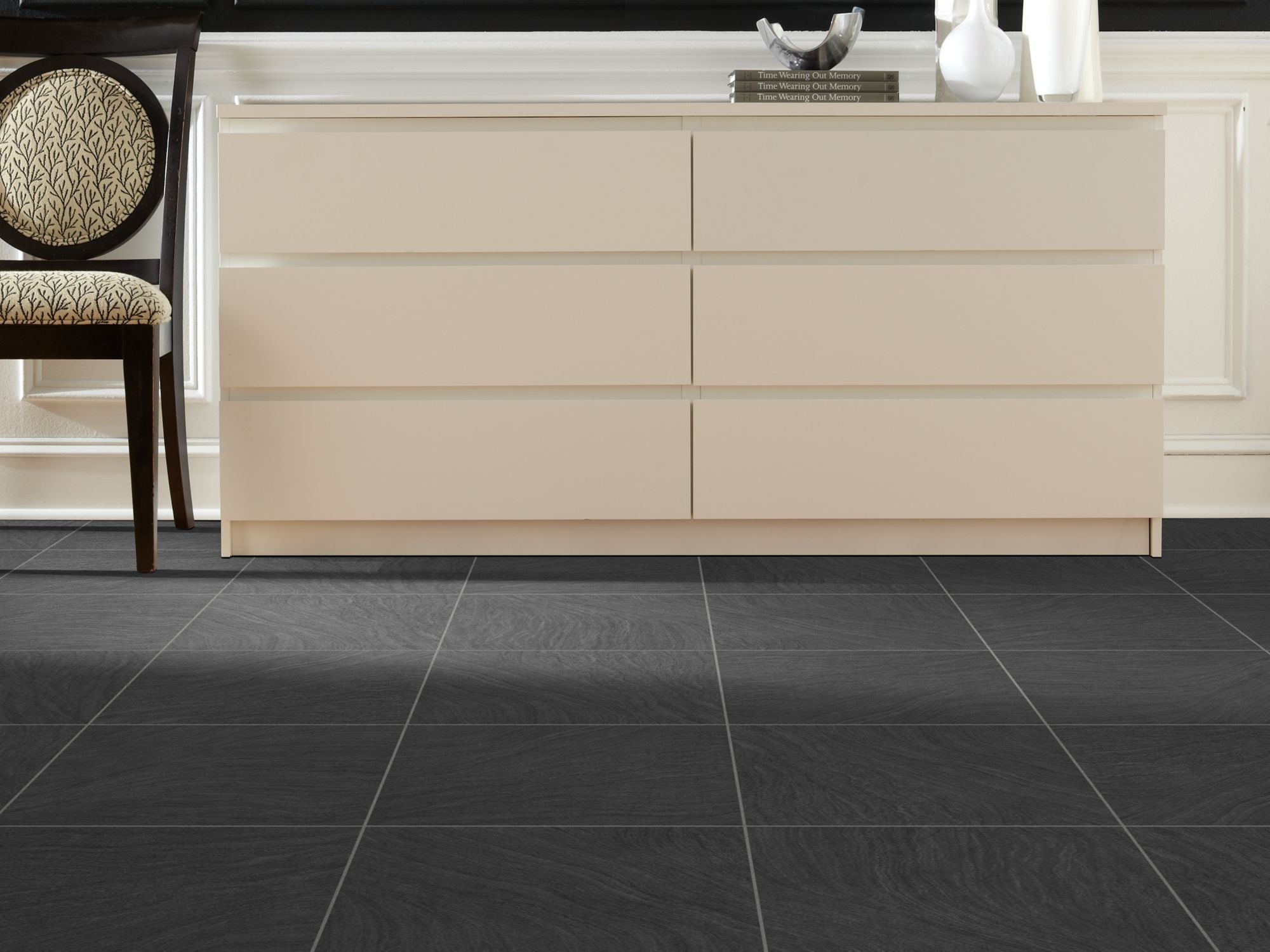 Fresco Vinyl Commercial by Shaw Floors in the color Coal flooring in a home, showing the finished look.