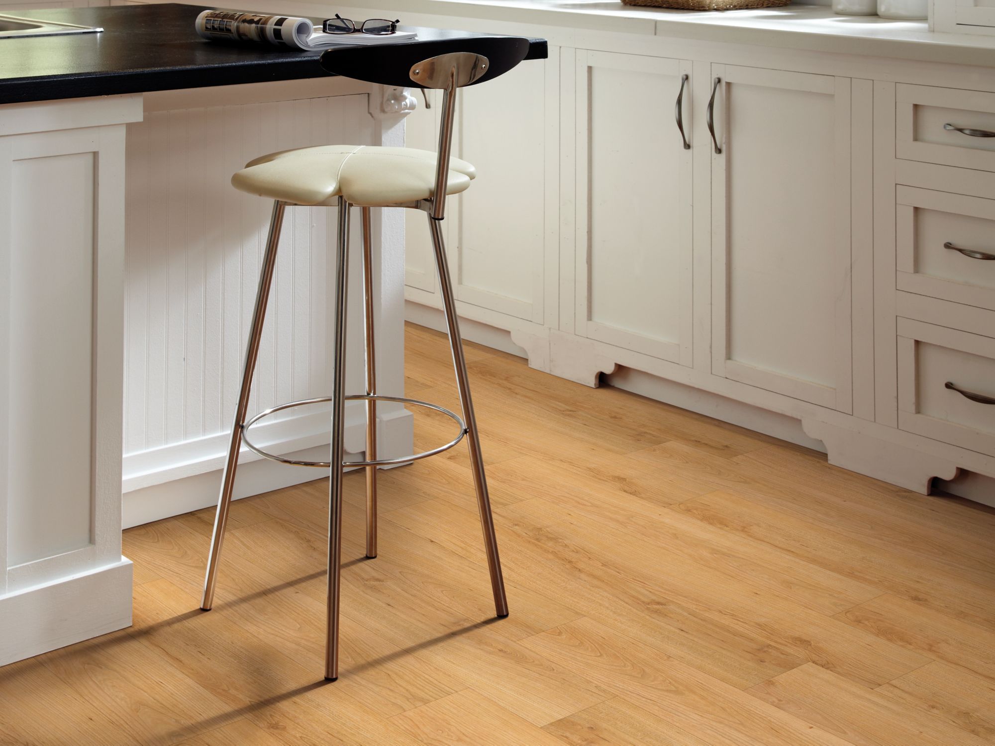 Personality 12Mil Vinyl Commercial by Shaw Floors in the color Central Park flooring in a home, showing the finished look.