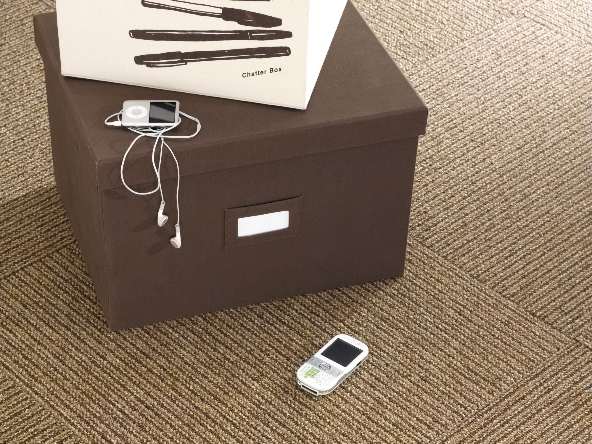 Chatterbox Commercial Carpet by Philadelphia Commercial in the color Schmooze. Image of golds carpet in a room.