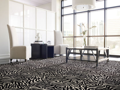 Zebra Commercial Carpet by Philadelphia Commercial in the color Migrant Beauty. Image of grays carpet in a room.