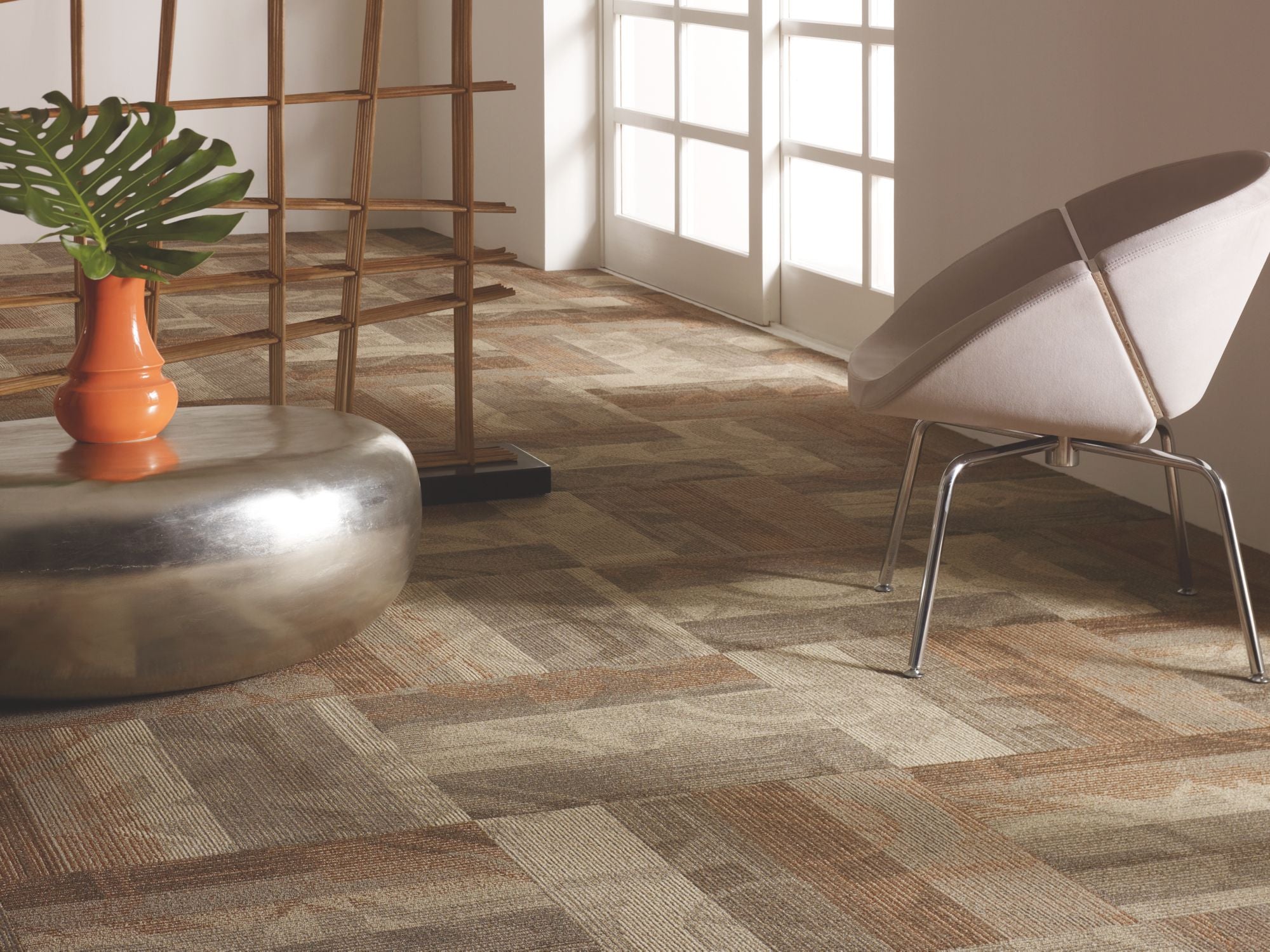 Feedback Commercial Carpet by Philadelphia Commercial in the color Transmitter. Image of golds carpet in a room.