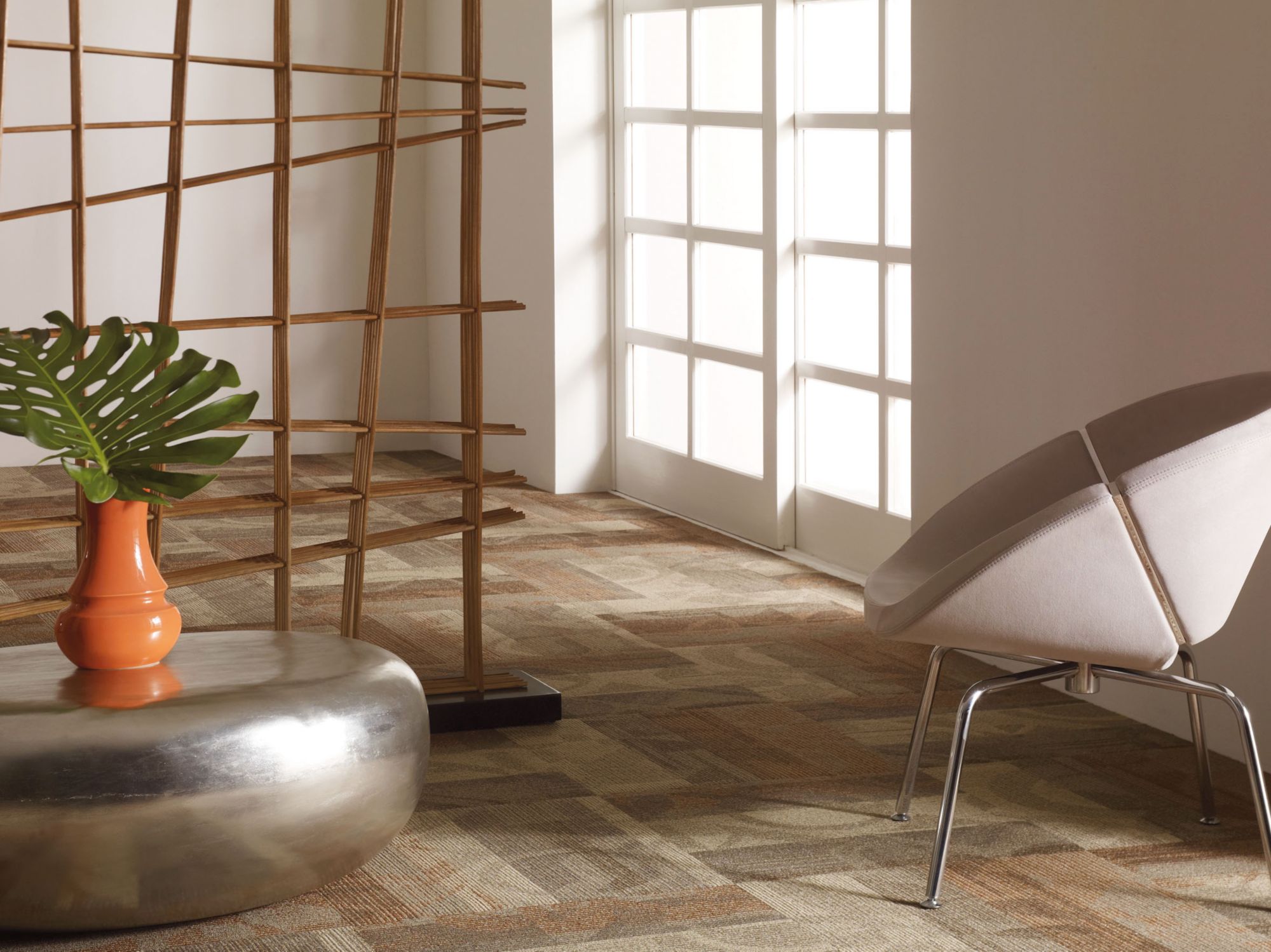 Feedback Commercial Carpet by Philadelphia Commercial in the color Radar. Image of oranges carpet in a room.