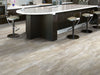 Stone Effects Vinyl Commercial by Shaw Floors in the color Antique Taupe flooring in a home, showing the finished look.