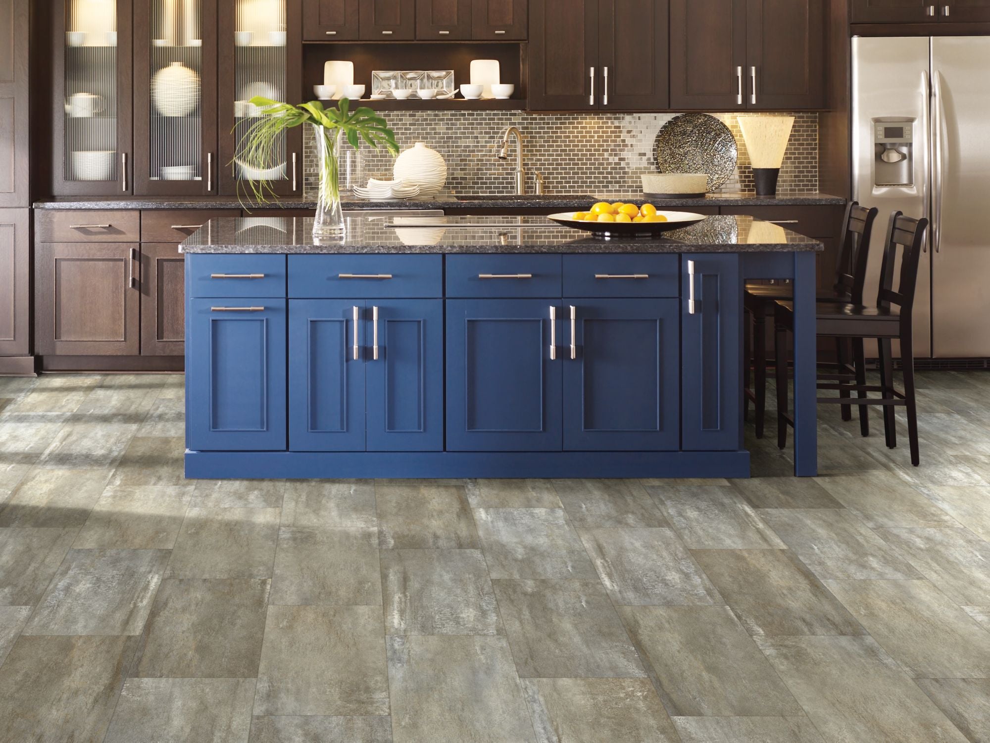 Stone Effects Vinyl Commercial by Shaw Floors in the color Aged Bronze flooring in a home, showing the finished look.