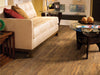 Wood Mix Vinyl Commercial by Shaw Floors in the color Fir flooring in a home, showing the finished look.