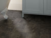 In The Grain 20 Vinyl Commercial by Shaw Floors in the color Teff flooring in a home, showing the finished look.