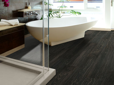 In The Grain 20 Vinyl Commercial by Shaw Floors in the color Black Rice flooring in a home, showing the finished look.