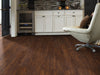 In The Park Vinyl Commercial by Shaw Floors in the color Rosso flooring in a home, showing the finished look.