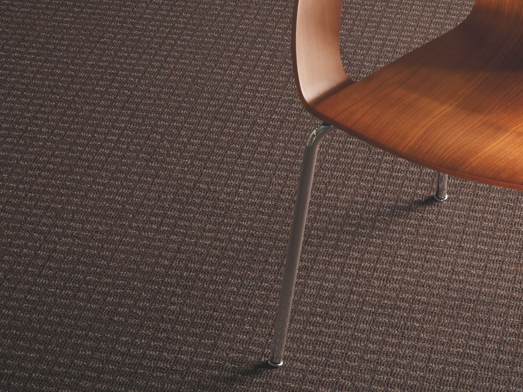 New Works Commercial Carpet by Philadelphia Commercial in the color Tighten Up. Image of browns carpet in a room.