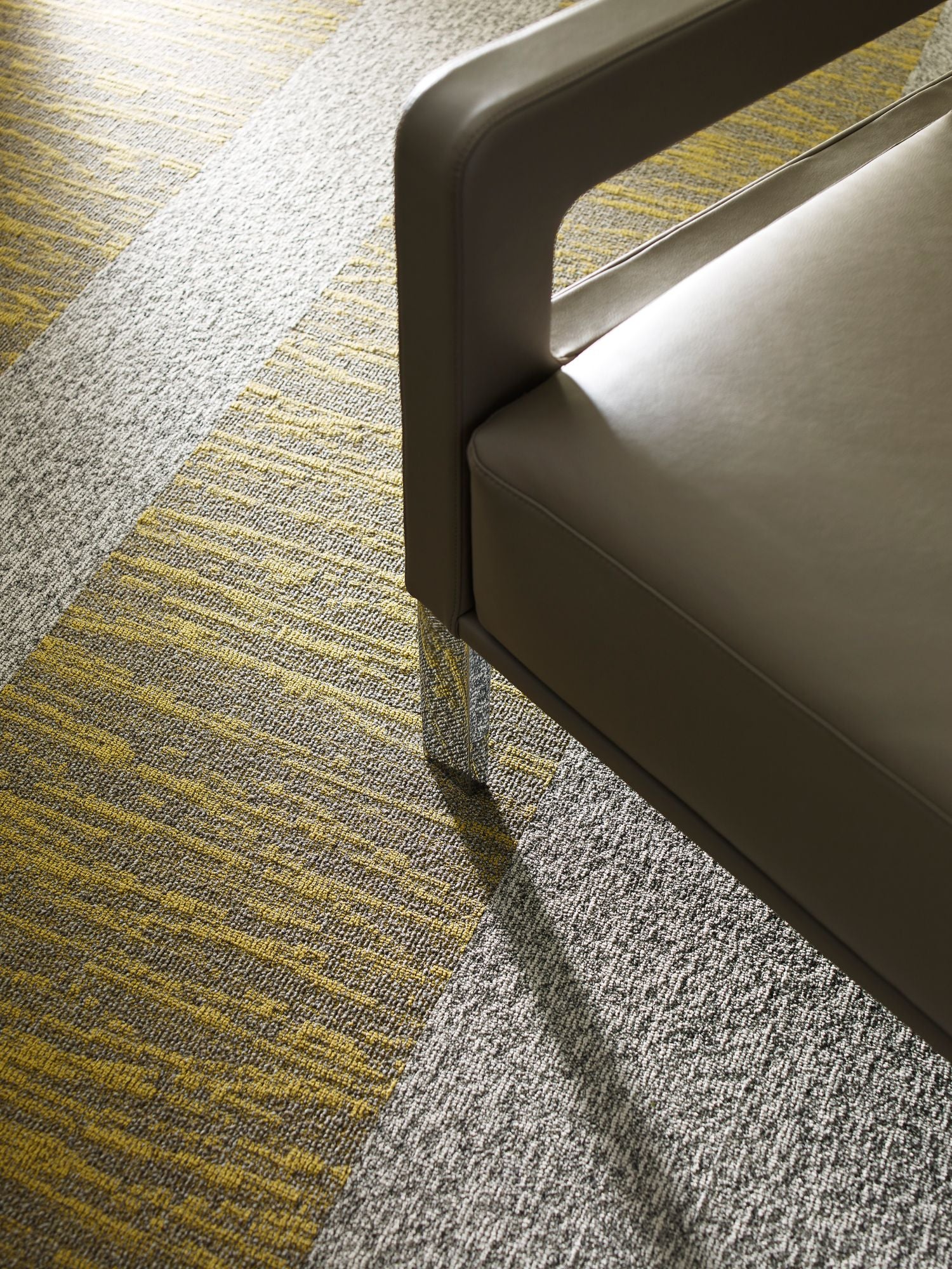 Tidewater Commercial Carpet by Philadelphia Commercial in the color Monadnock. Image of golds carpet in a room.