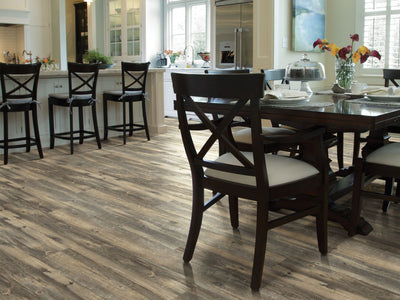 Mesa Trail Vinyl Commercial by Shaw Floors in the color Rock House flooring in a home, showing the finished look.