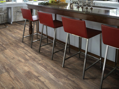 Mesa Trail Vinyl Commercial by Shaw Floors in the color Mullens Cove flooring in a home, showing the finished look.