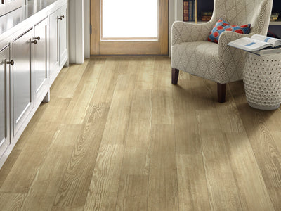In The Grainii12  by Shaw Floors in the color Nutshell flooring in a home, showing the finished look.