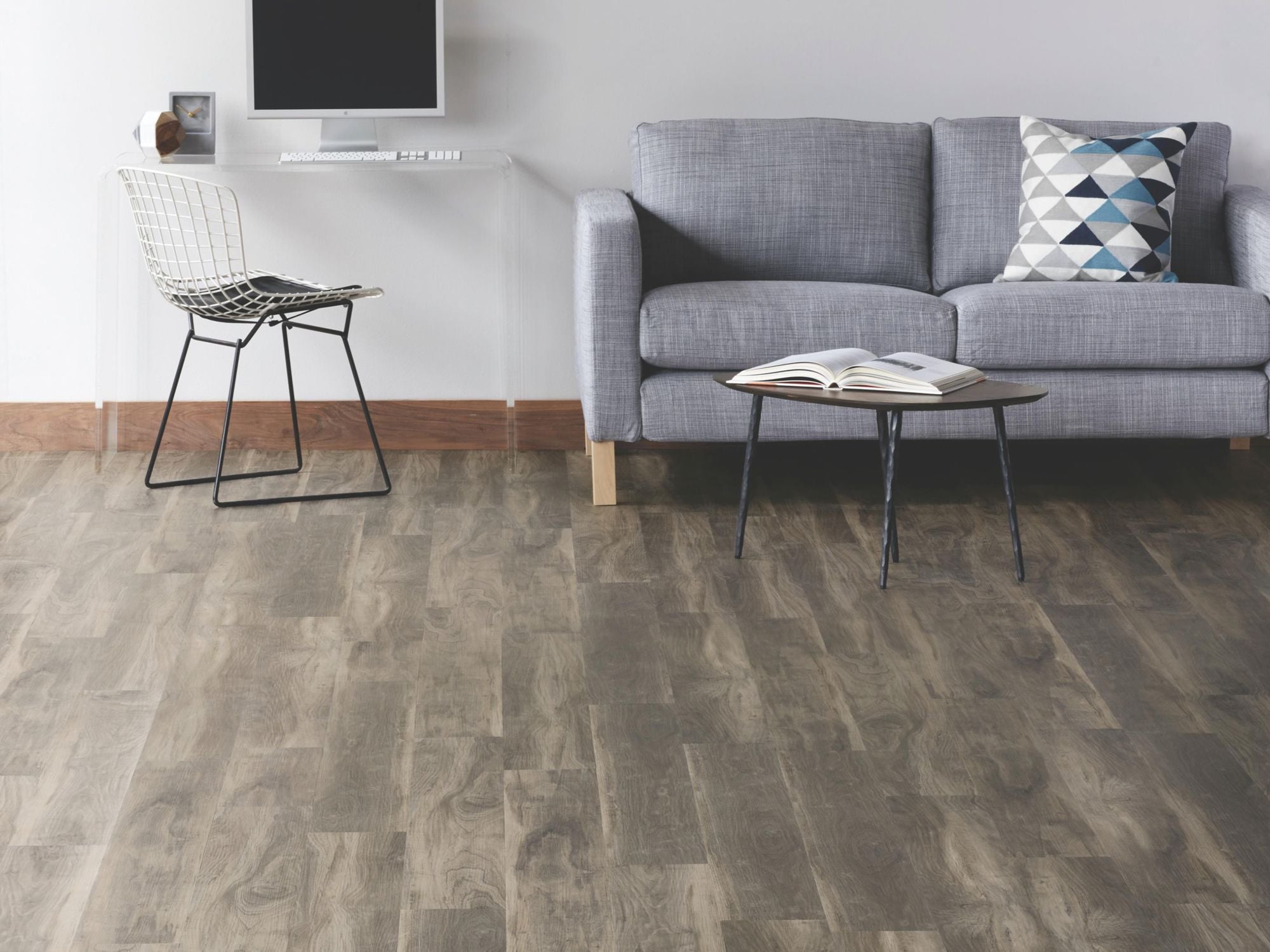 In The Grainii12  by Shaw Floors in the color Flaxseed flooring in a home, showing the finished look.