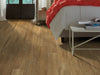 In The Grainii12  by Shaw Floors in the color Farro flooring in a home, showing the finished look.