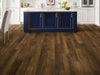 In The Grain Ii 20 Vinyl Commercial by Shaw Floors in the color Sandalwood flooring in a home, showing the finished look.
