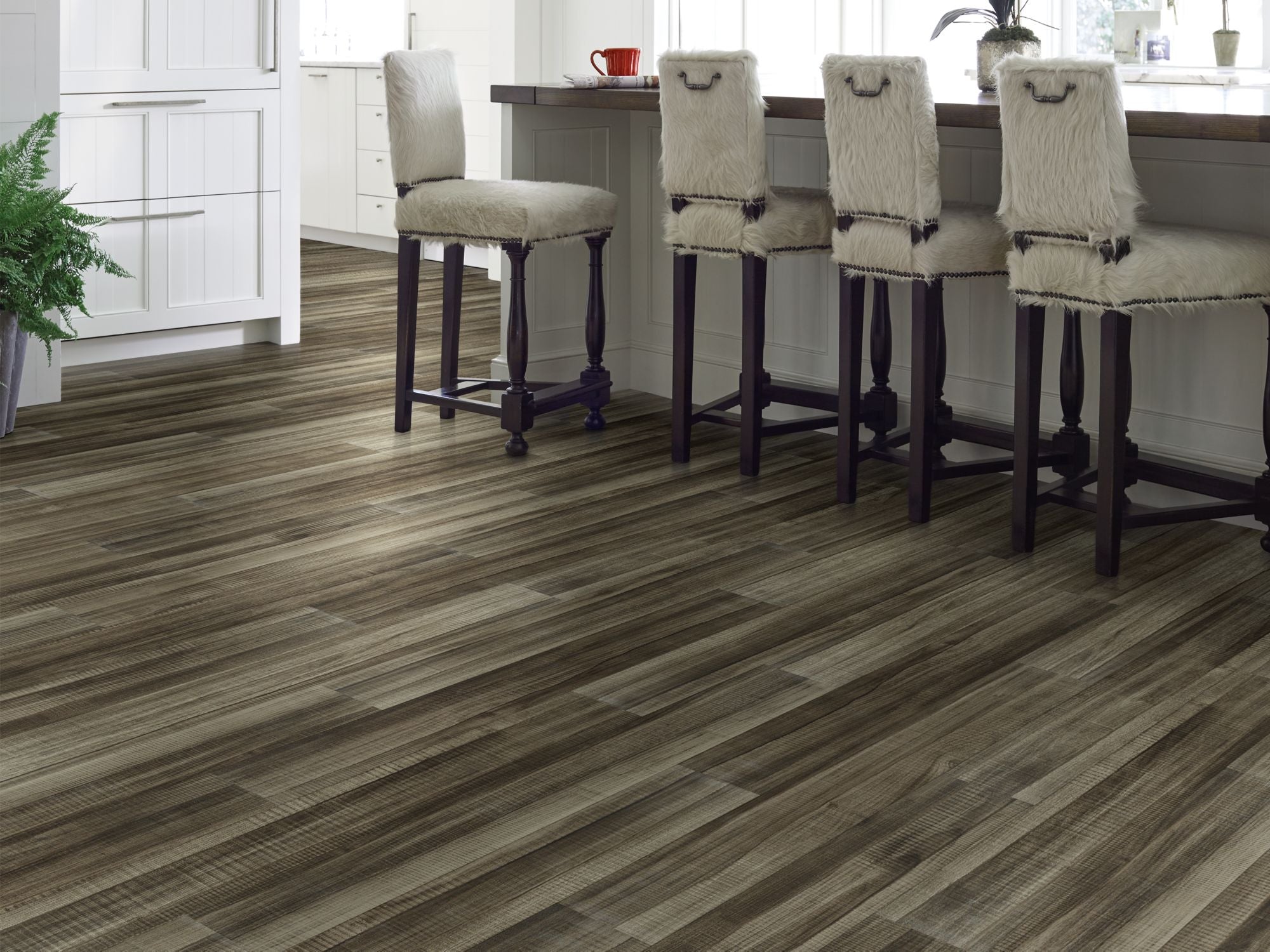 In The Grain Ii 20 Vinyl Commercial by Shaw Floors in the color Cotton Seed flooring in a home, showing the finished look.