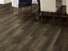 In The Grain Ii 20 Vinyl Commercial by Shaw Floors in the color Burlwood flooring in a home, showing the finished look.