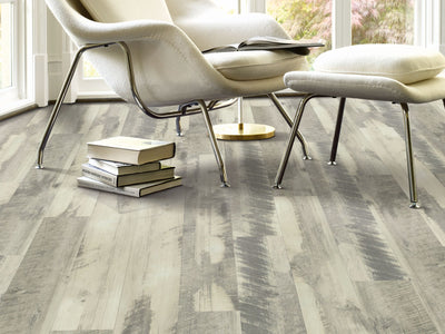 Transcend Vinyl Residential by Shaw Floors in the color Functional Gray flooring in a home, showing the finished look.