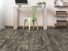 Transcend Vinyl Residential by Shaw Floors in the color Grizzle Gray flooring in a home, showing the finished look.
