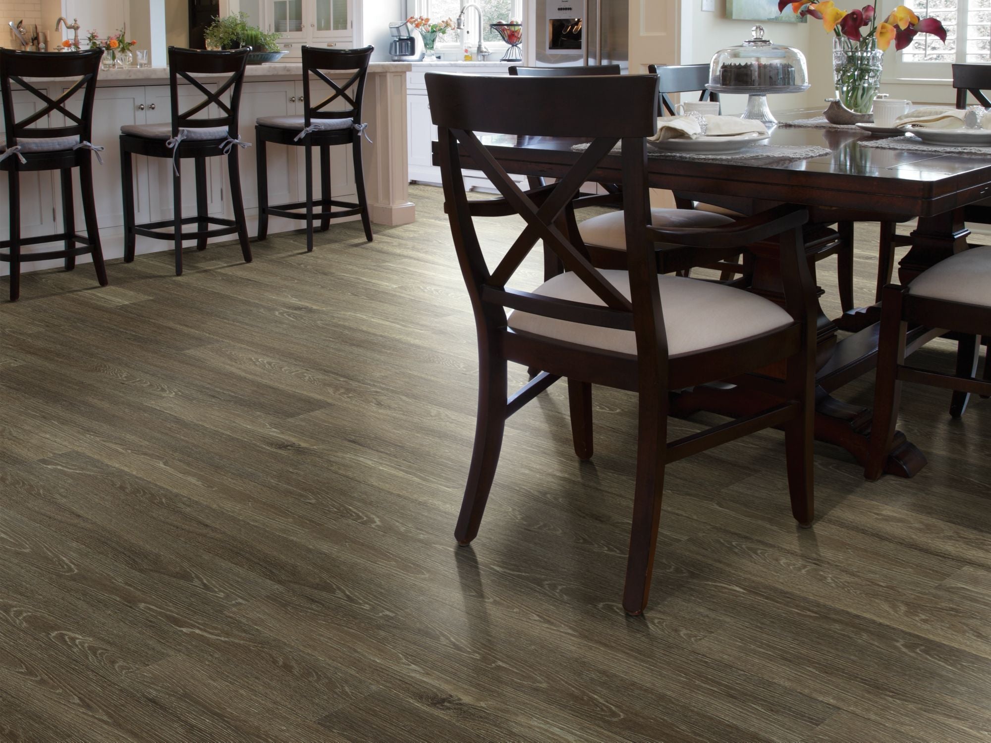 Sustain 12 Mil Vinyl Residential by Shaw Floors in the color Wheat flooring in a home, showing the finished look.