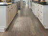 Palo Duro Mixed Width Anderson Hardwood in the color nickel by Shaw flooring in a home, showing the finished look.