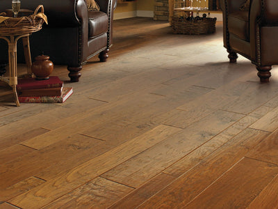 Palo Duro Mixed Width Anderson Hardwood in the color golden ore  by Shaw flooring in a home, showing the finished look.