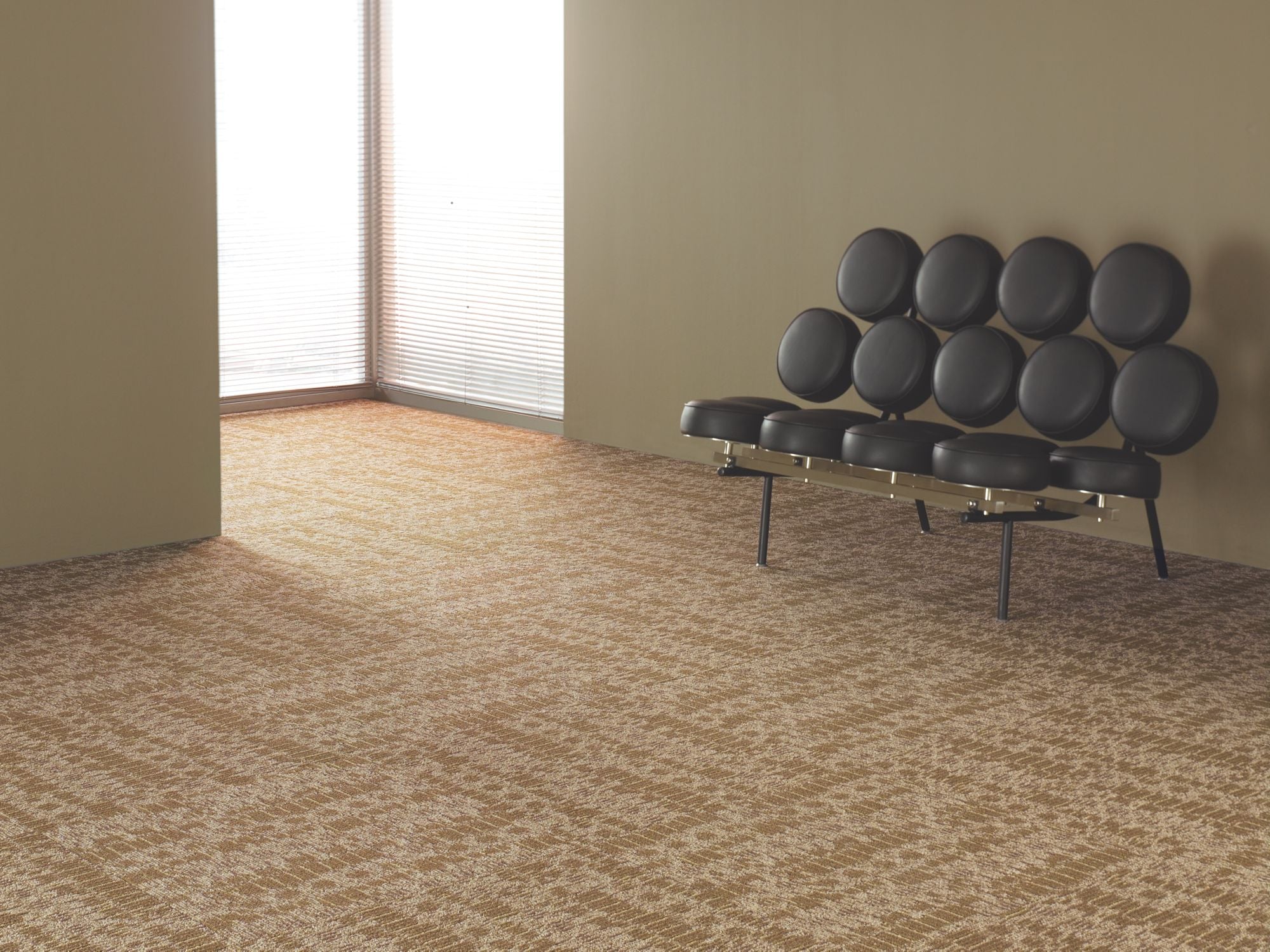 Chain Reaction Commercial Carpet by Philadelphia Commercial in the color Echo. Image of golds carpet in a room.