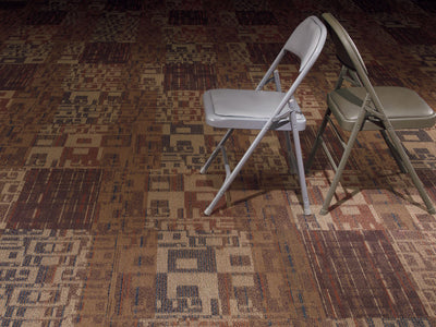 Intermix Commercial Carpet by Philadelphia Commercial in the color Amalgamate. Image of oranges carpet in a room.